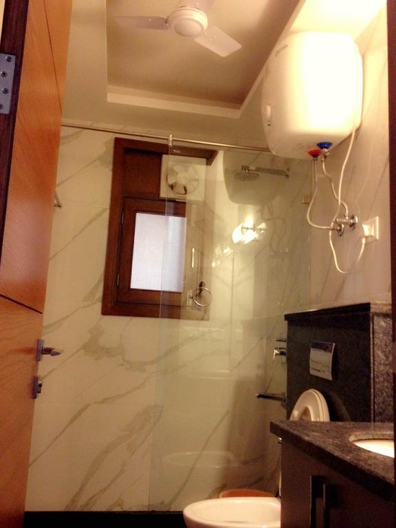 Woodpecker Service Apartamentos - Green Park Nueva Delhi Habitación foto